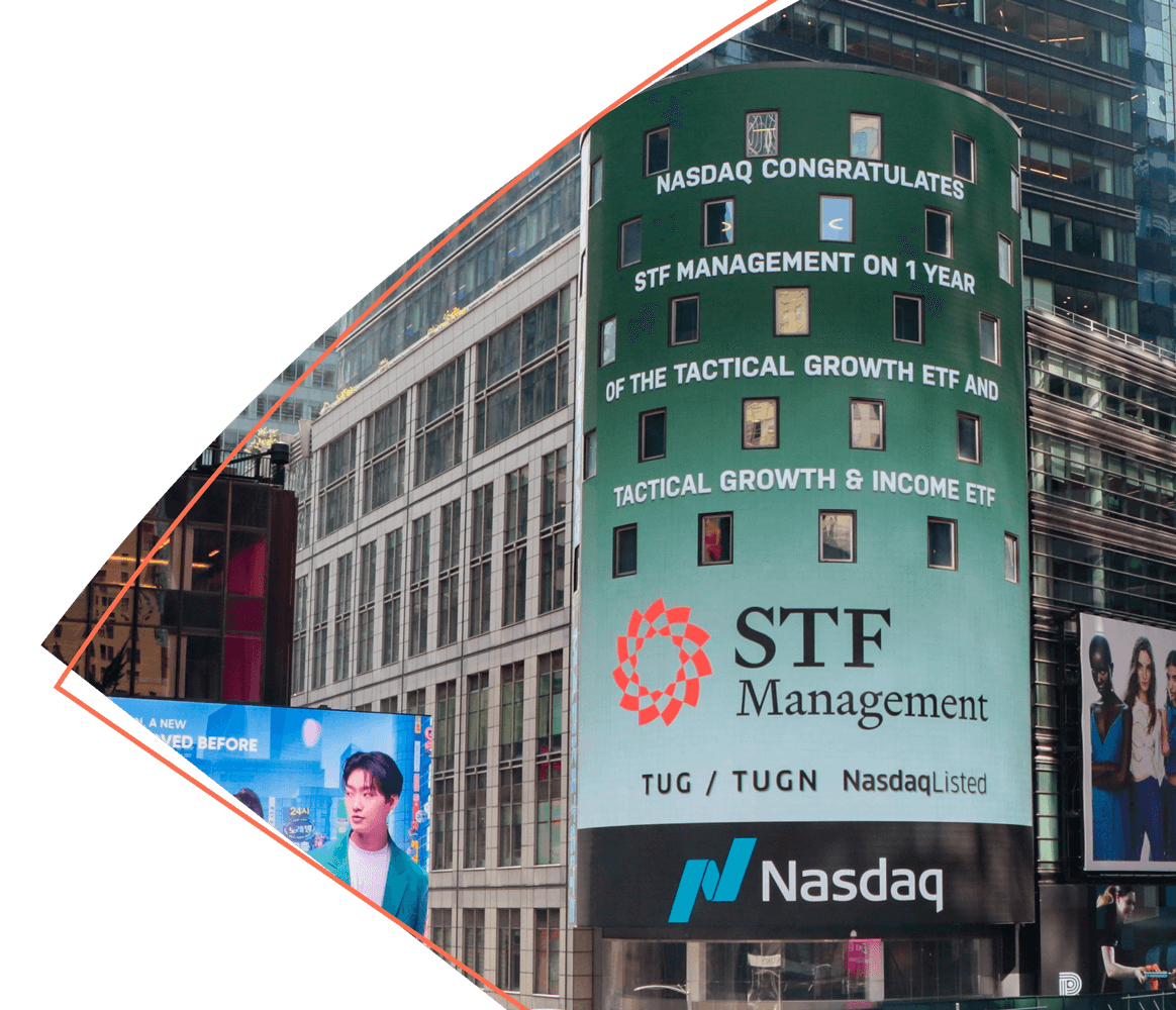 Photo of "STF Management | Nasdaq" on a large display billboard.